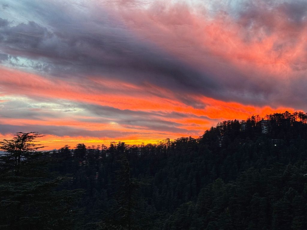 Sunset over Kasumpti-Mehli forest ridgeline of Shimla