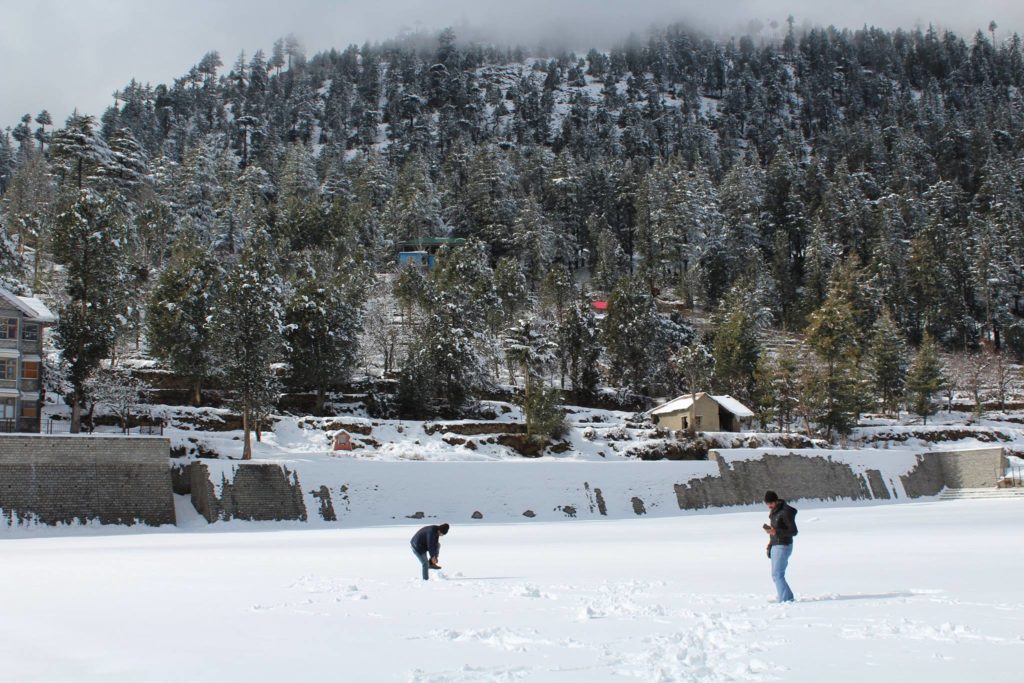 Strolling in snow in Kalpa football ground